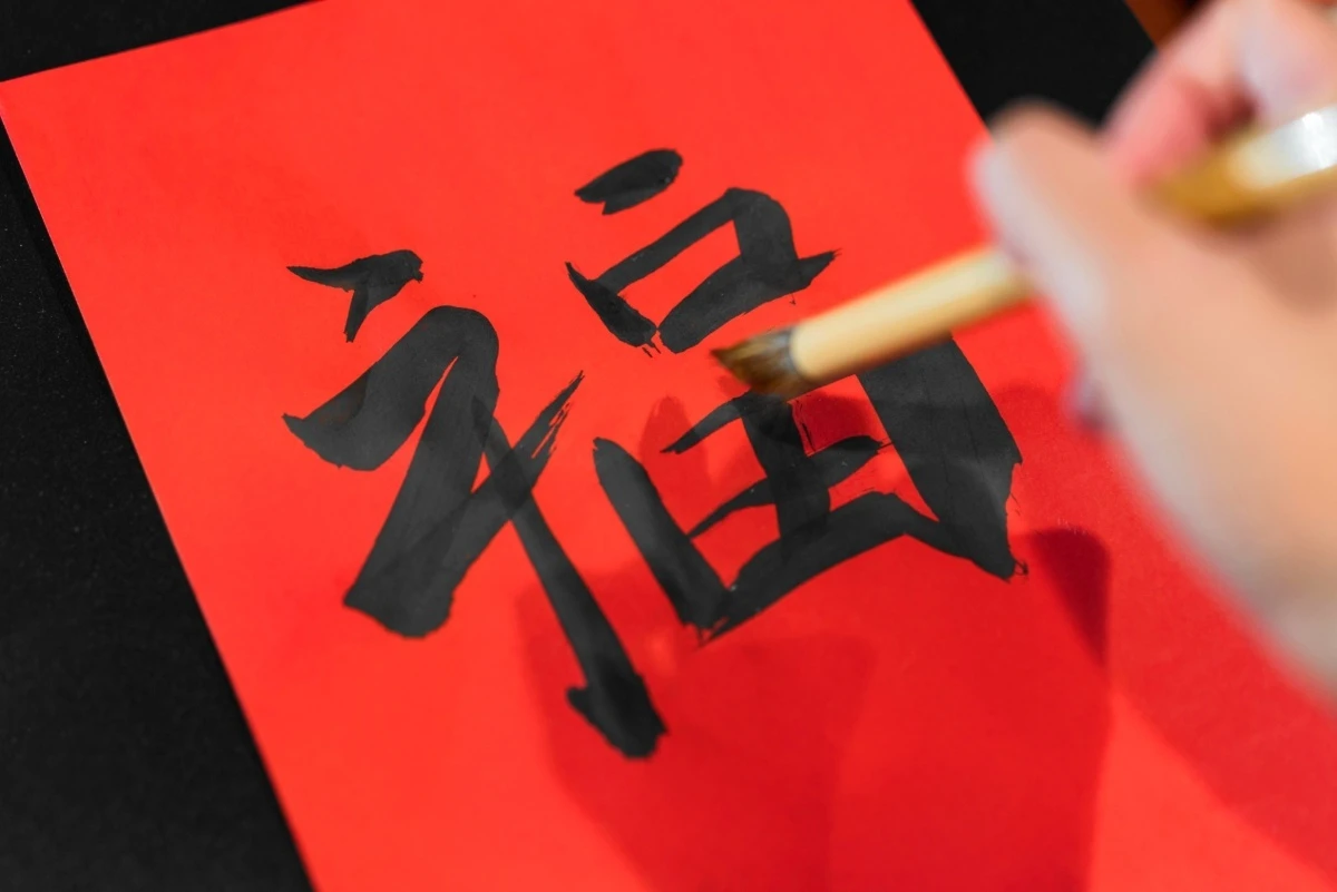 close-up-hand-painting-japanese-symbol (1) (1)